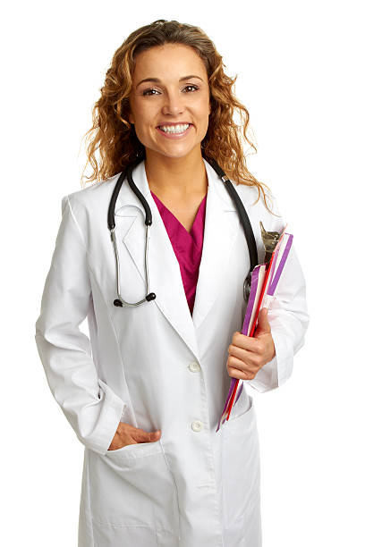 beautiful female doctor holding clipboard smiling http://i1100.photobucket.com/albums/g409/matthewennisphotography/MedicalBanner123.jpg